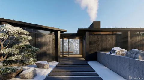 a balcony with furniture and wooden floor