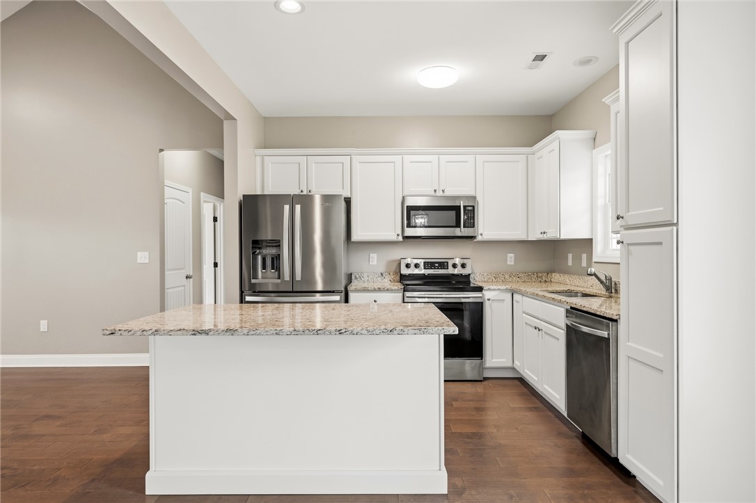 1411 Dunn Road Anderson, SC 29625 - Photo 12 of 30 This functional kitchen features ample counter space and modern appliances, perfect for everyday living.