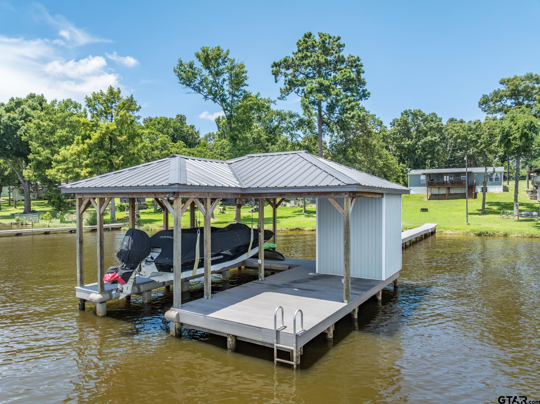 21516 Water Ridge Road Chandler, TX 75758 - Photo 40 of 48 a small pool with table and chairs