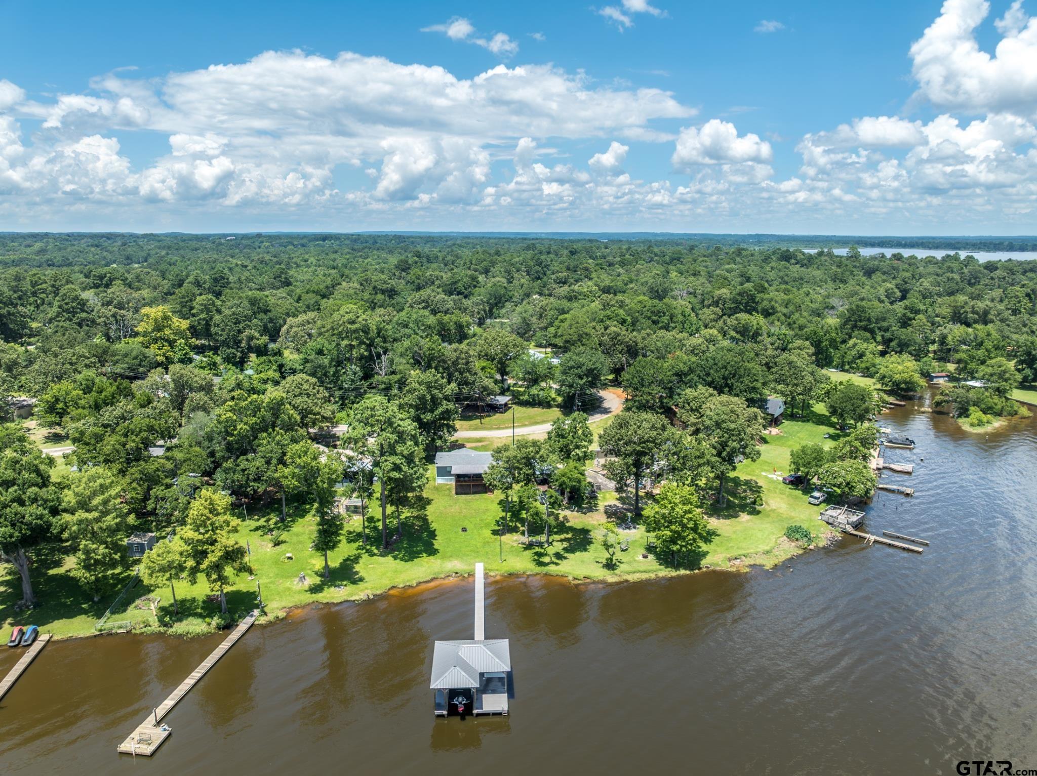21516 Water Ridge Road Chandler, TX 75758 - Photo 45 of 48 a view of a yard in front of the house