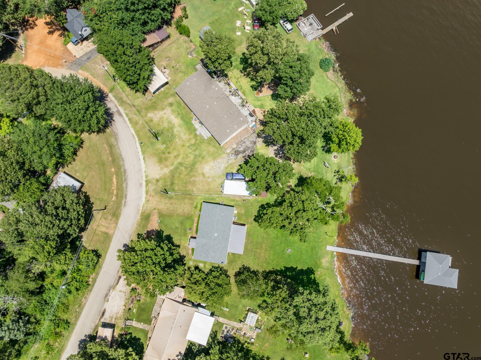 21516 Water Ridge Road Chandler, TX 75758 - Photo 47 of 48 an aerial view of a house with a yard