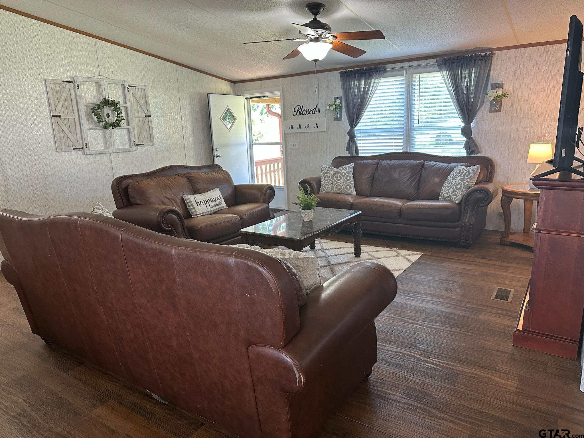 21516 Water Ridge Road Chandler, TX 75758 - Photo 5 of 48 a living room with furniture and a large window