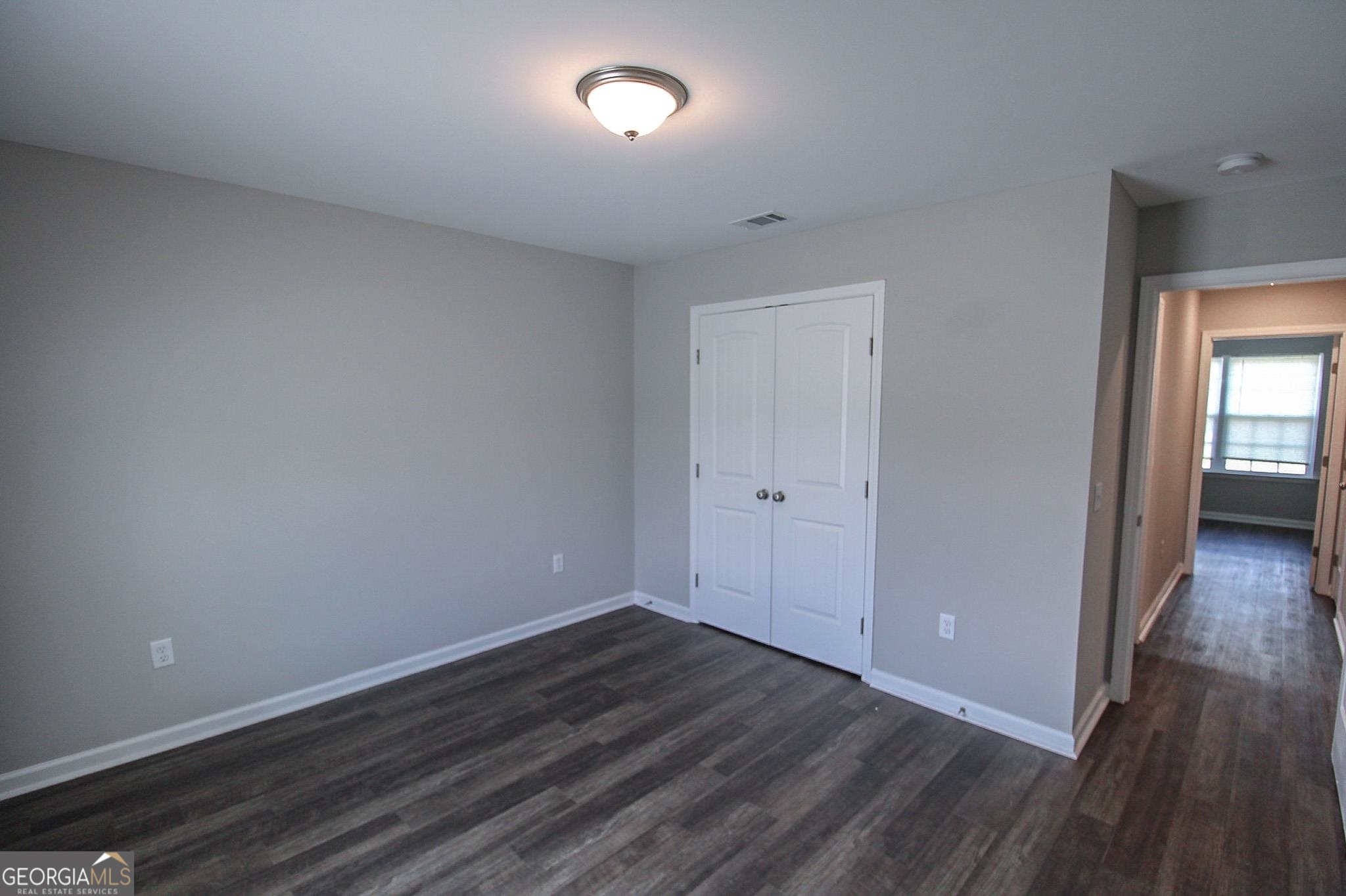 200 Evans Terrace Statesboro, GA 30458 - Photo 10 of 13 wooden floor in an empty room