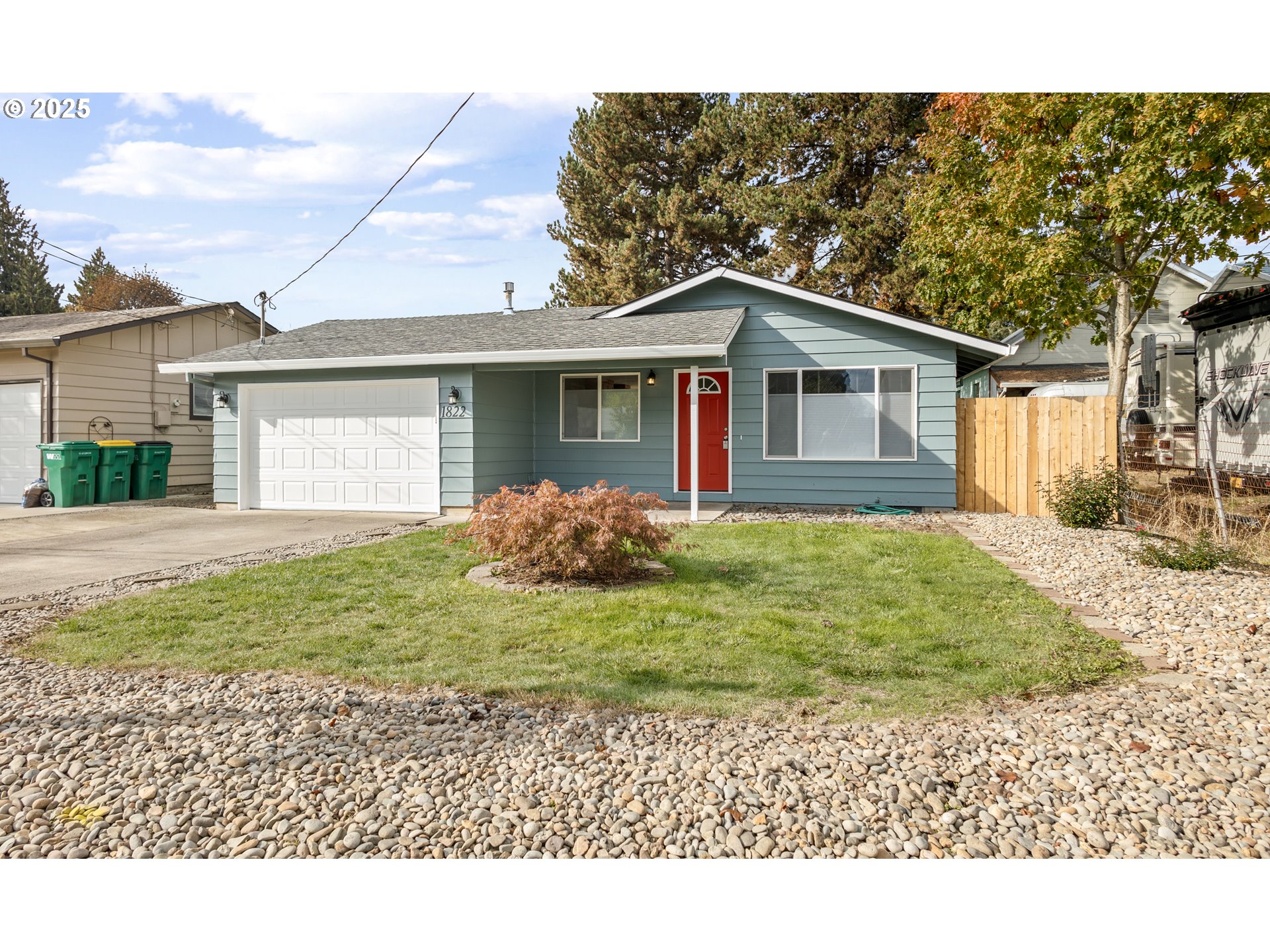 1822 Hawthorne Street Forest Grove, OR 97116 - Photo 1 of 18 a front view of a house with a yard