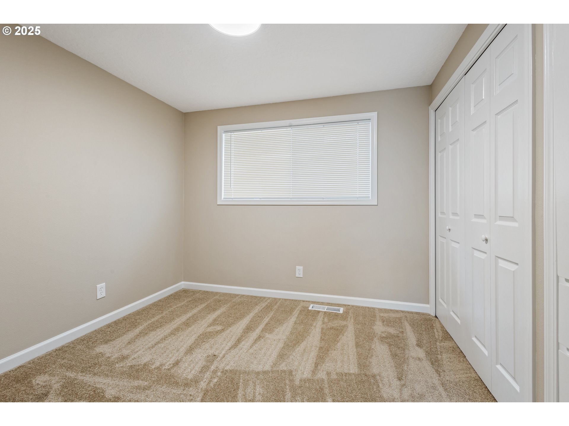 1822 Hawthorne Street Forest Grove, OR 97116 - Photo 15 of 18 a view of an empty room with a window