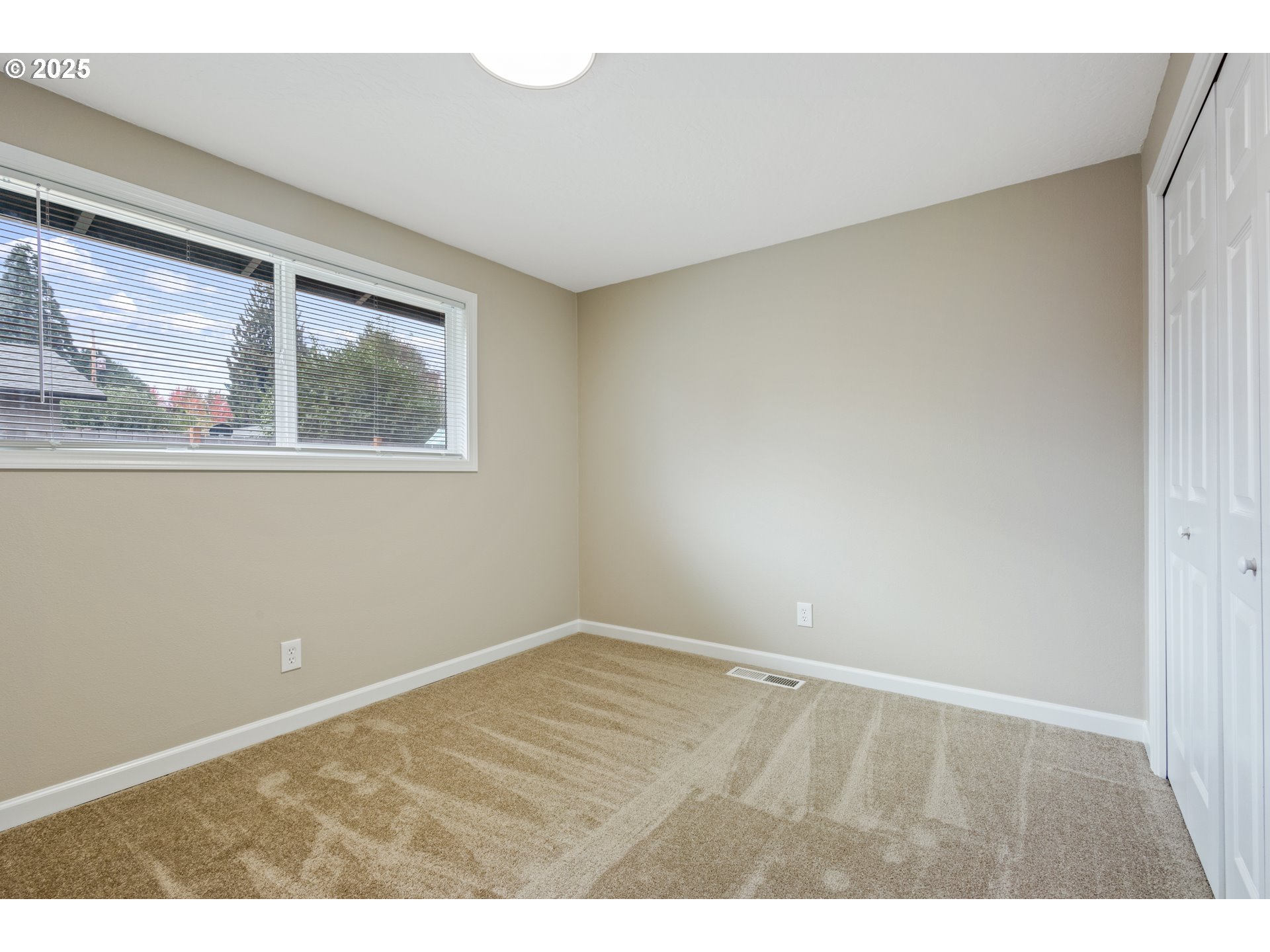 1822 Hawthorne Street Forest Grove, OR 97116 - Photo 17 of 18 a view of an empty room with a window