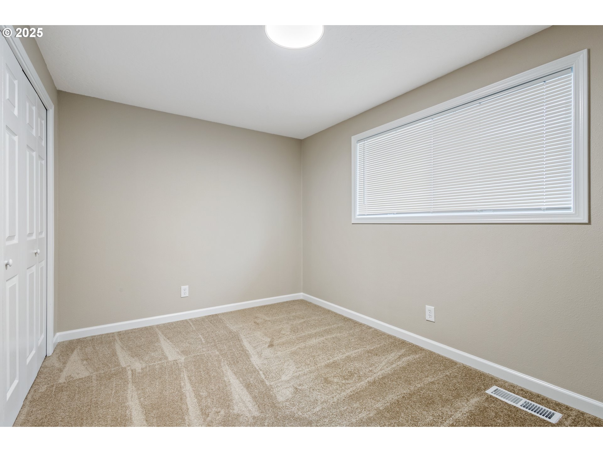 1822 Hawthorne Street Forest Grove, OR 97116 - Photo 18 of 18 a view of an empty room with a window