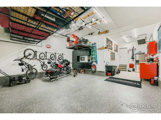 a view of a garage with a bike and storage