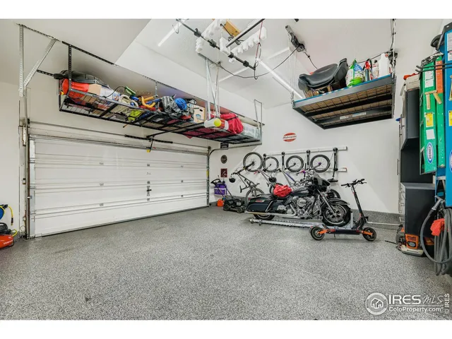 a view of a patio with couches and potted plants