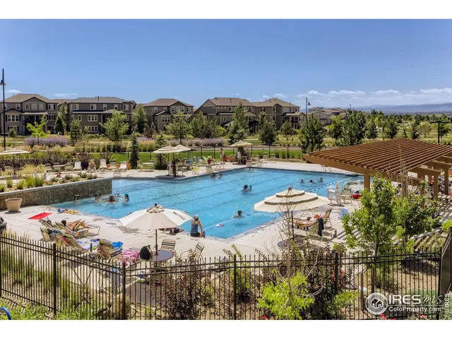 a view of a lake with boats and trees