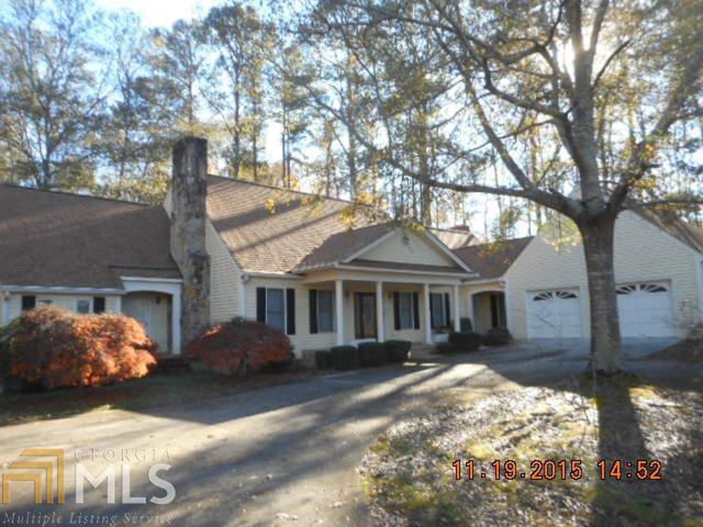 10188 Fitzgerald Road Jonesboro, GA 30238 - Photo 1 of 1 a front view of a house with a yard