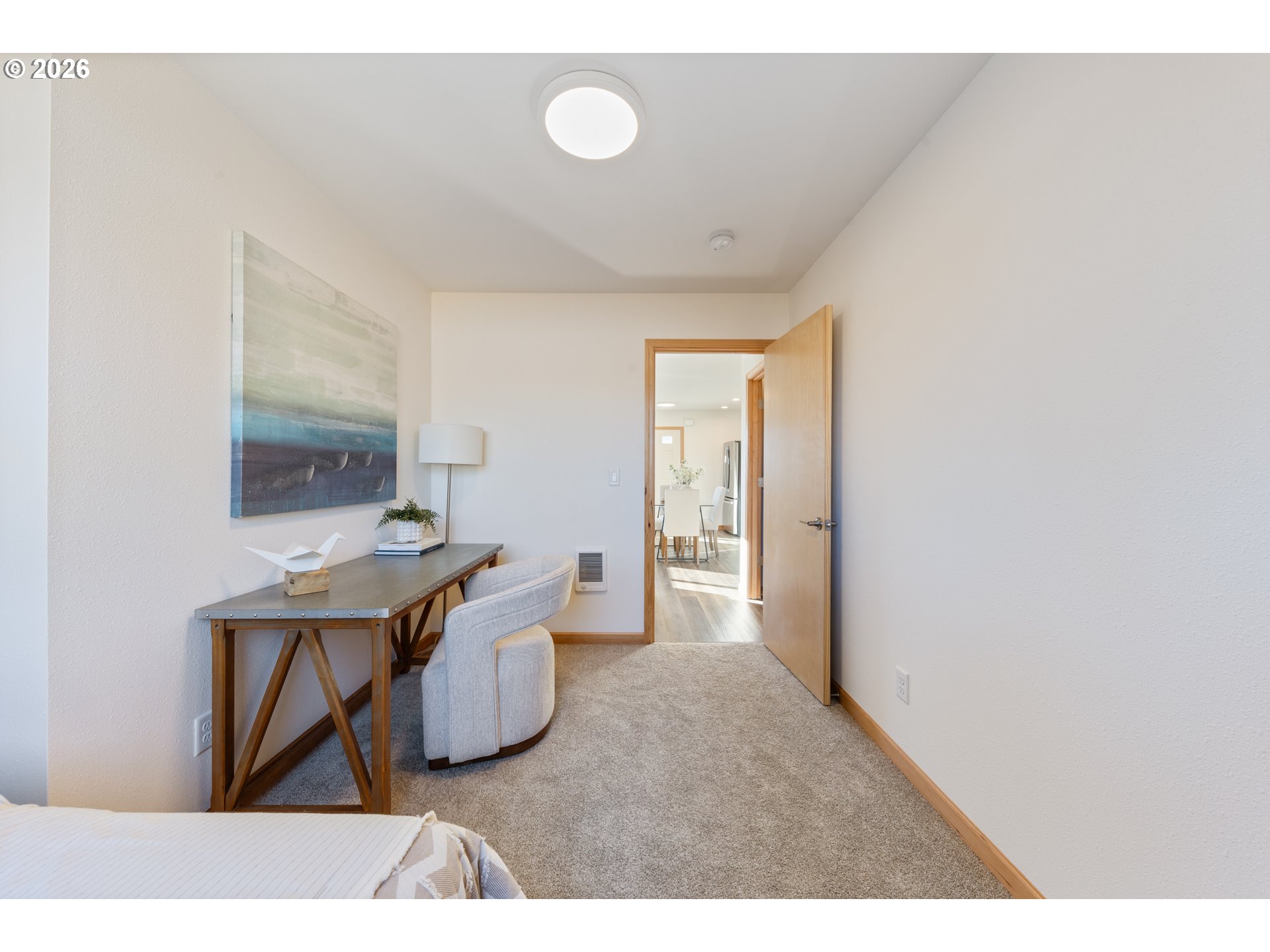 715 ST Charles Street Eugene, OR 97402 - Photo 28 of 30 a living room with a table and chairs