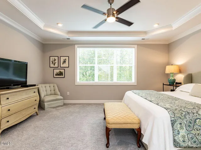 a spacious bathroom with a bathtub and shower
