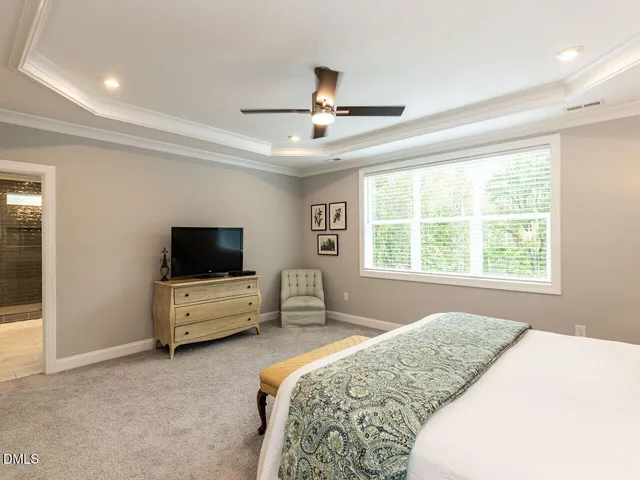 a bathroom with double vanity sinks and a mirror