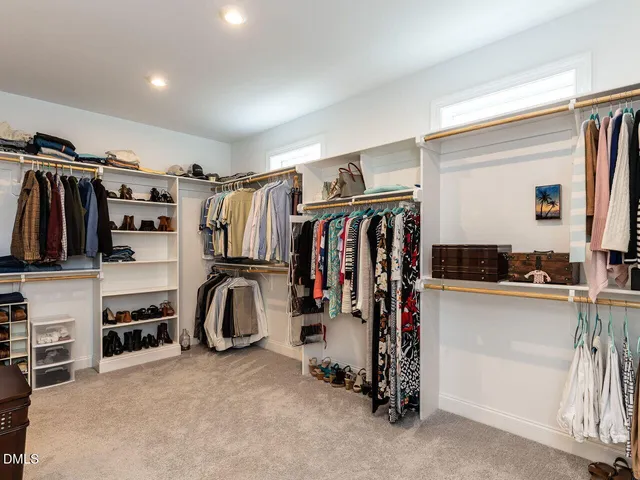 a work room with furniture and windows