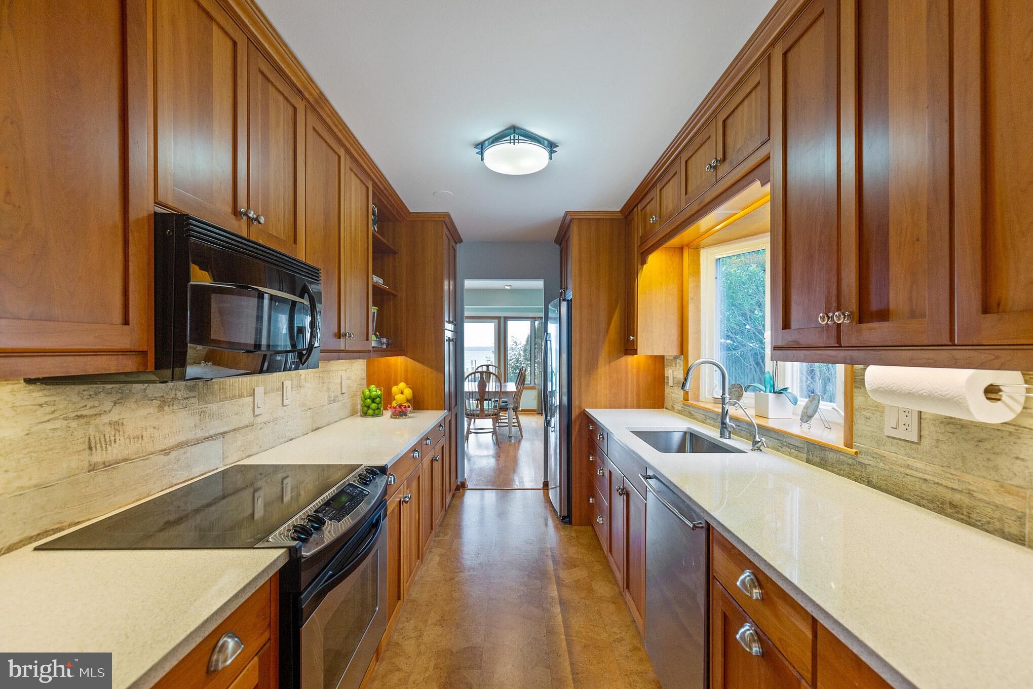 38091 Beach Road Coltons Point, MD 20626 - Photo 14 of 48 Kitchen with cork flooring and quartz counters