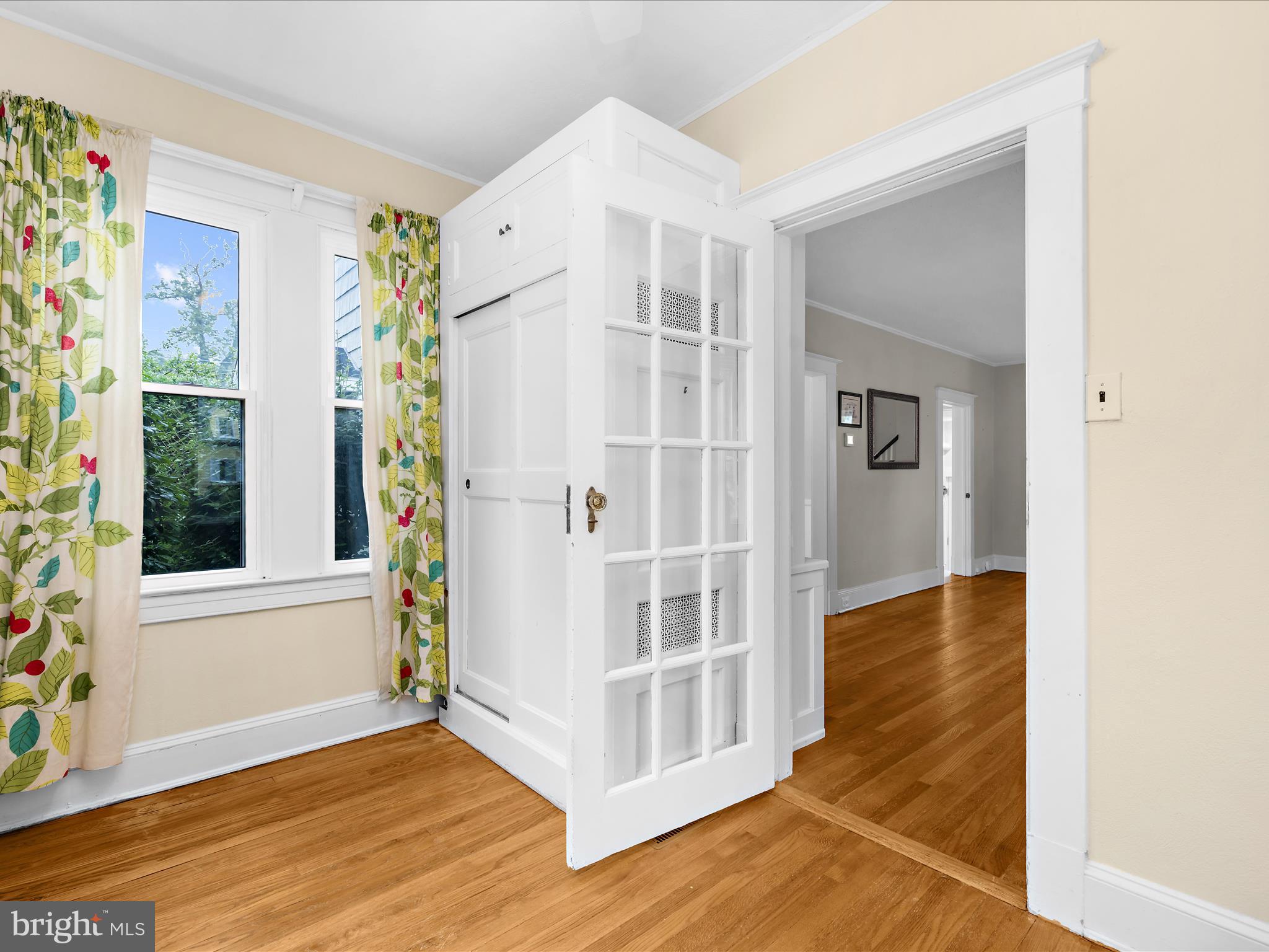 112 Homewood Road Linthicum Heights, MD 21090 - Photo 12 of 44 a view of a bedroom with wooden floor and windows