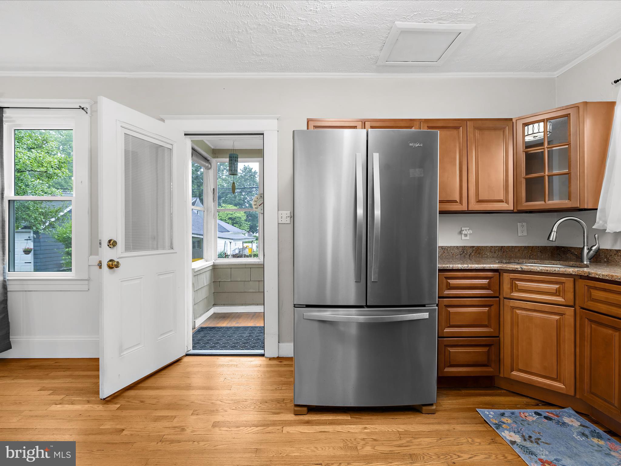 112 Homewood Road Linthicum Heights, MD 21090 - Photo 20 of 44 a kitchen with stainless steel appliances granite countertop a refrigerator and a stove top oven
