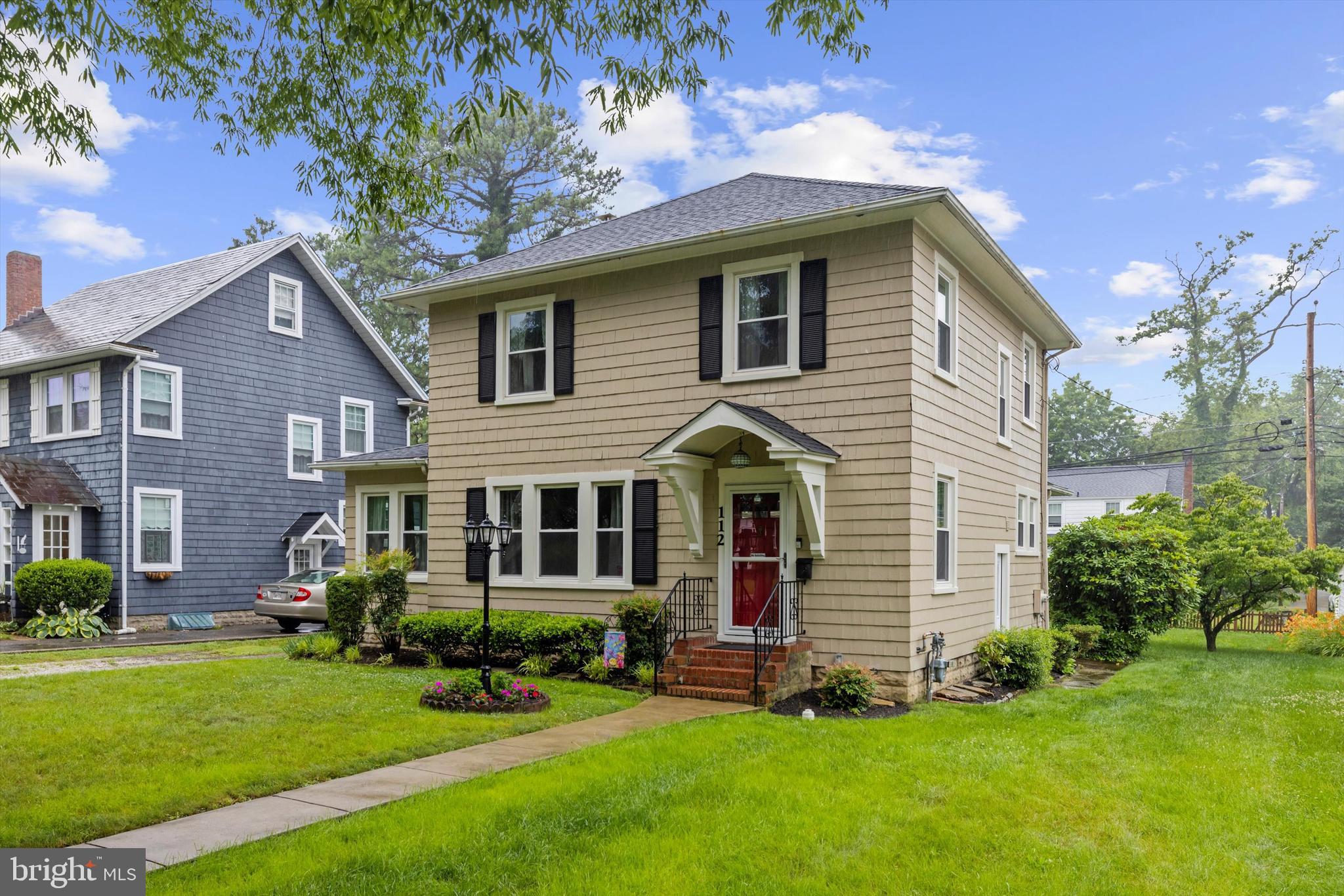 112 Homewood Road Linthicum Heights, MD 21090 - Photo 2 of 44 a front view of a house with a garden and plants