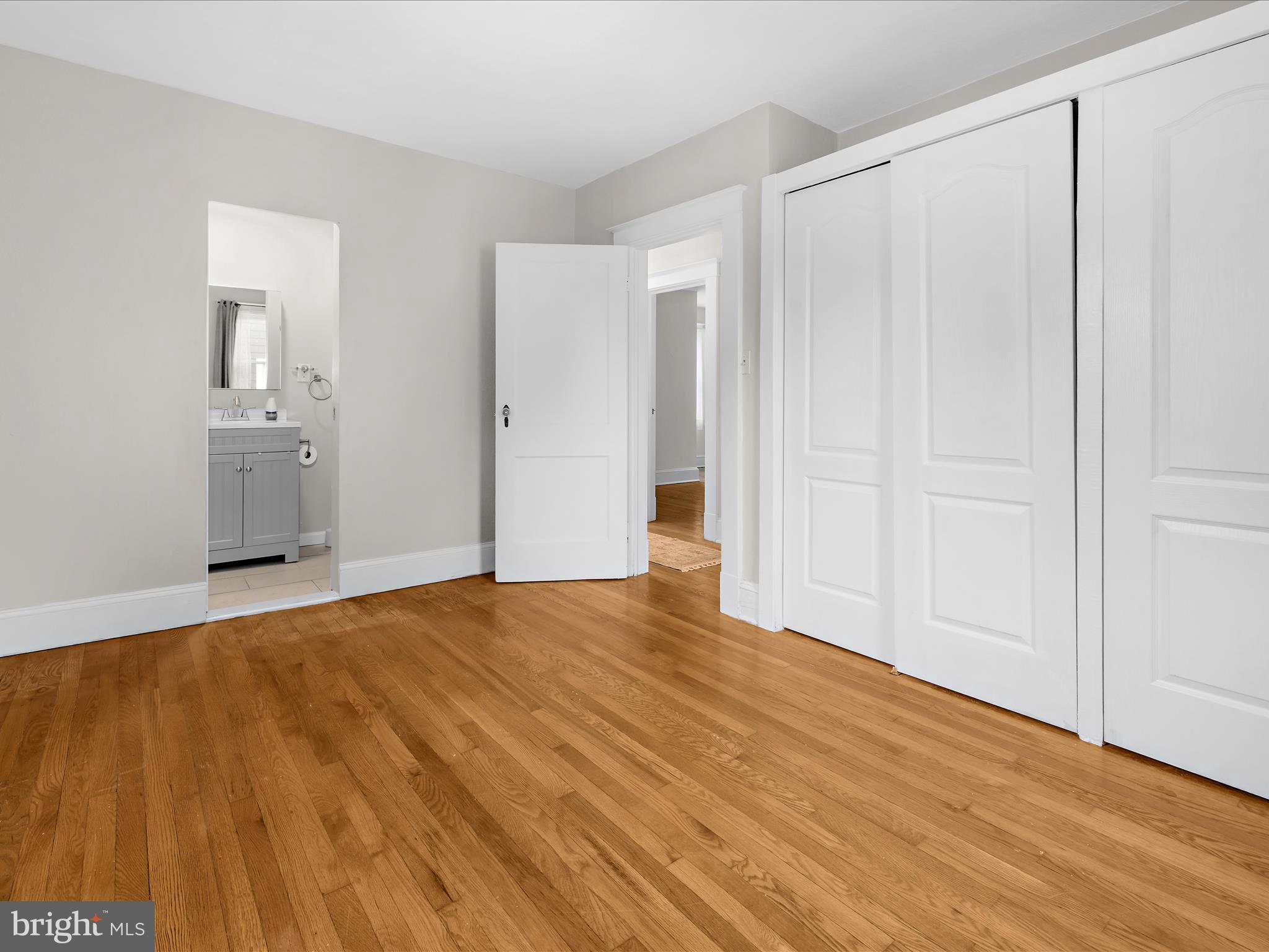 112 Homewood Road Linthicum Heights, MD 21090 - Photo 32 of 44 a view of an empty room and wooden floor