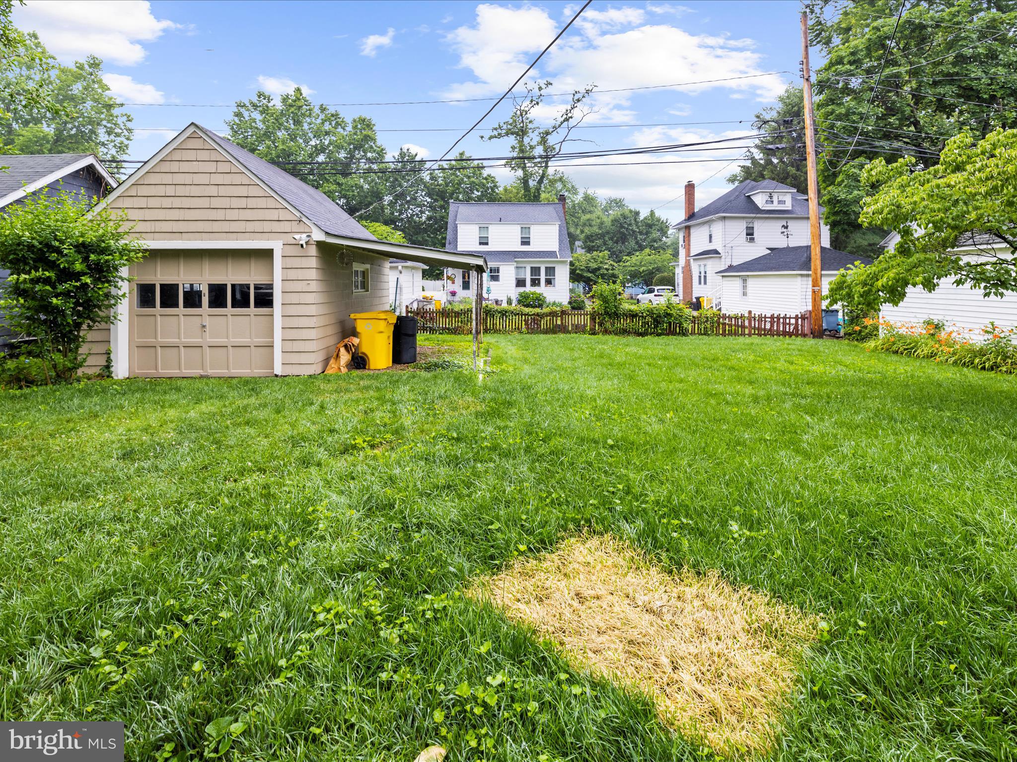 112 Homewood Road Linthicum Heights, MD 21090 - Photo 37 of 44 a view of a house with a backyard and a patio