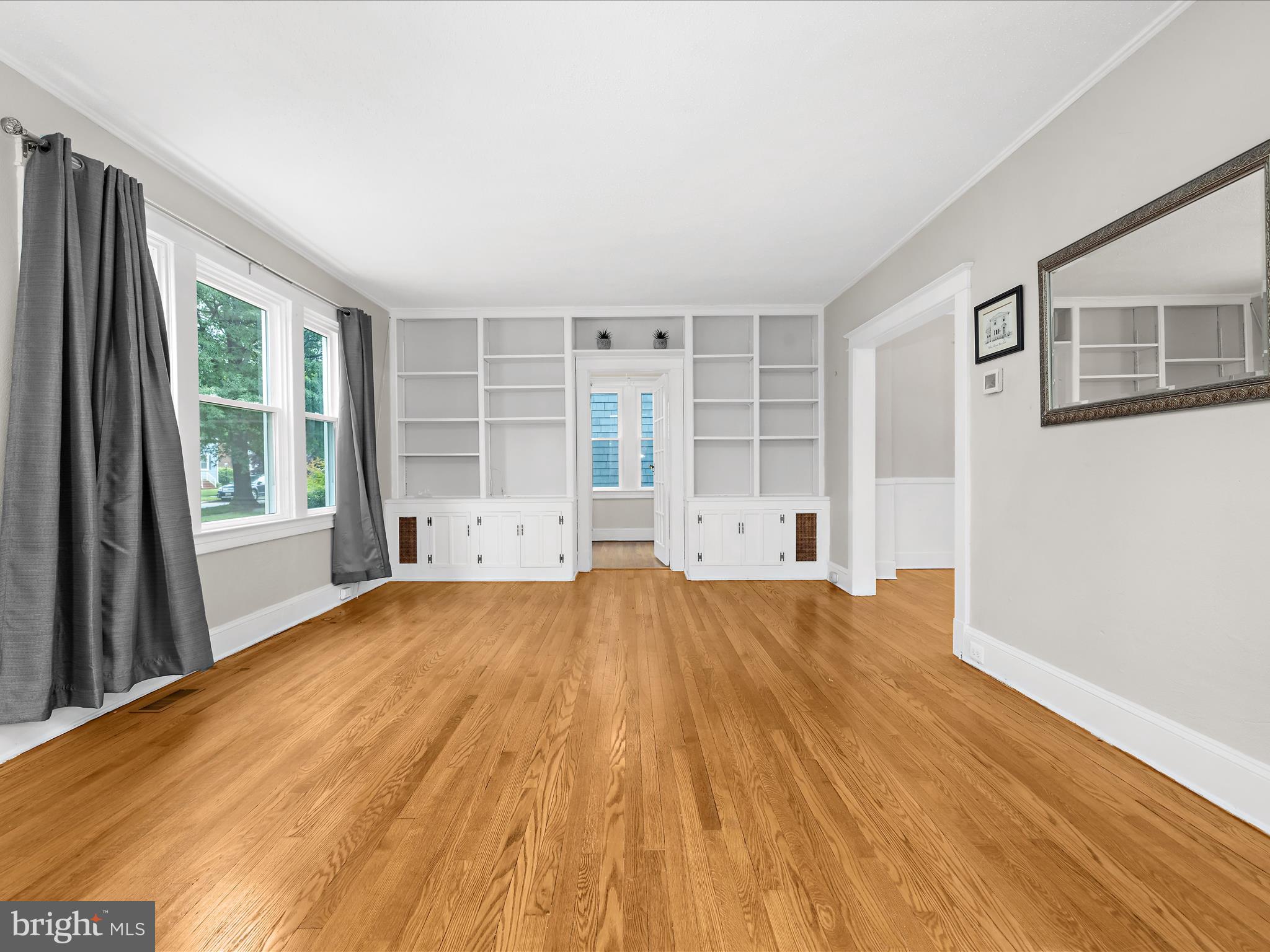 112 Homewood Road Linthicum Heights, MD 21090 - Photo 5 of 44 a view of empty room with wooden floor and fan
