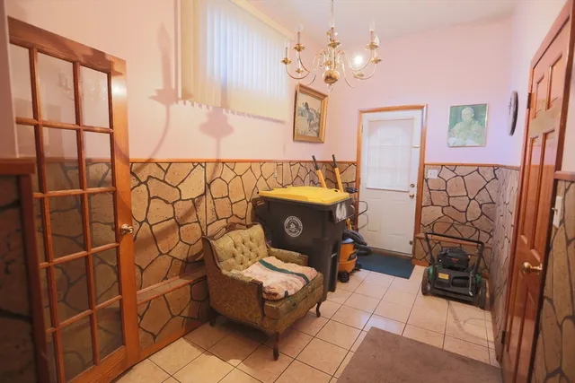 a view of parking garage with cars parked