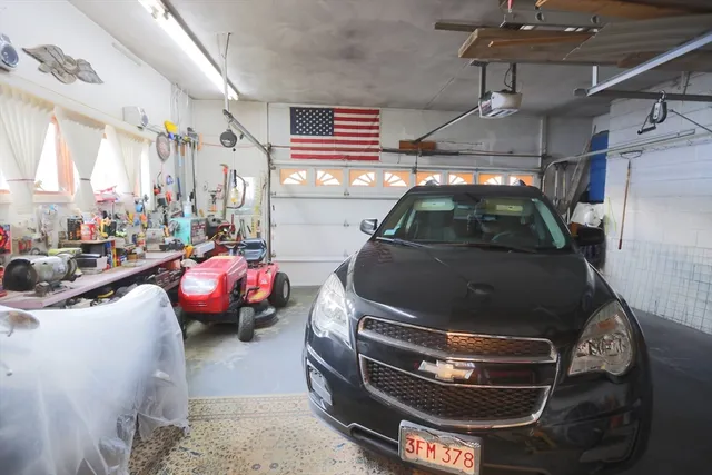 a balcony with chairs and a table