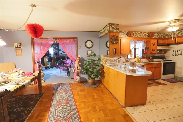 a view of workspace with window and bathroom