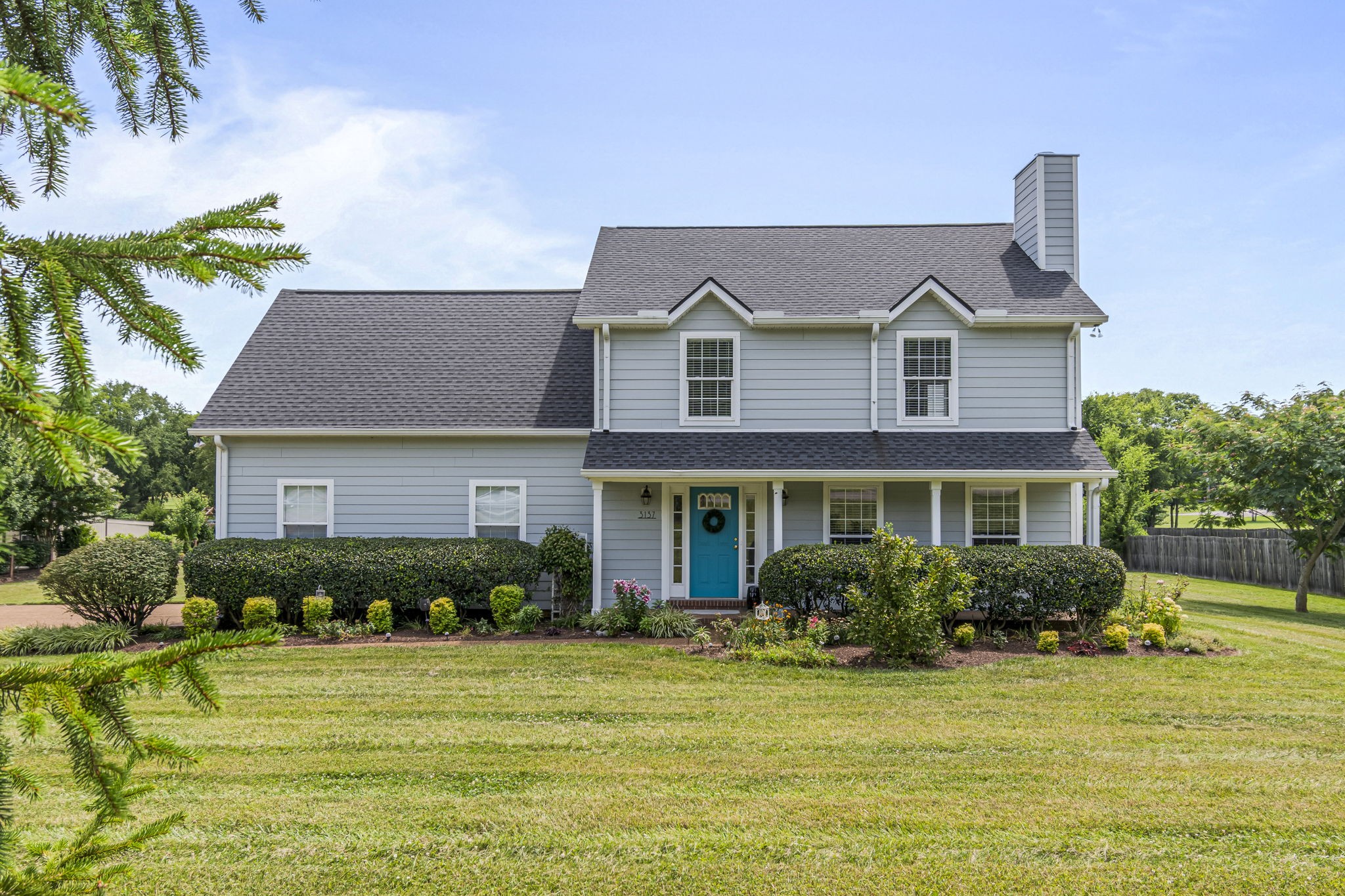 3137 Southall Road Franklin, TN 37064 - Photo 1 of 51 a front view of a house with a garden