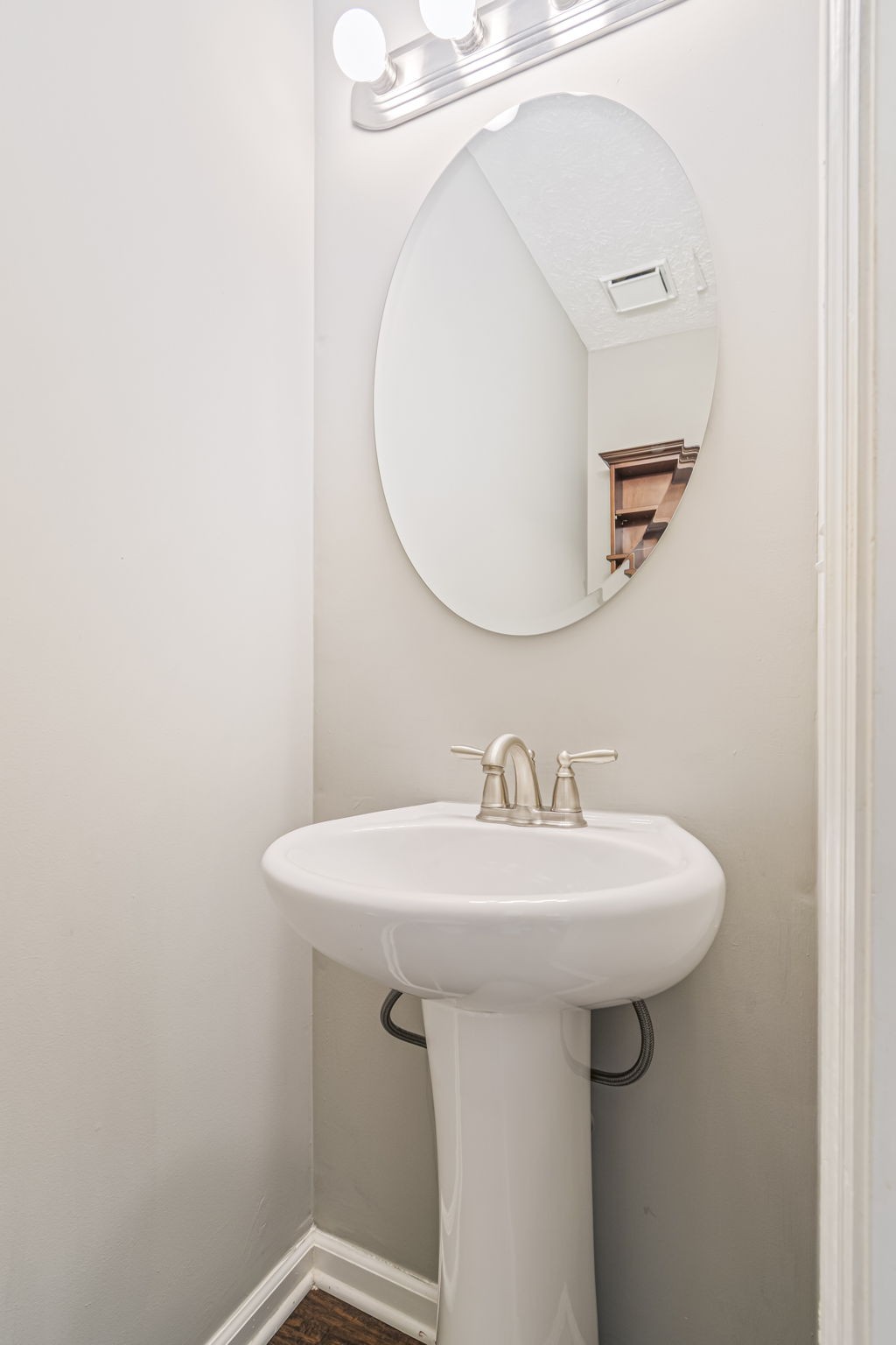 3137 Southall Road Franklin, TN 37064 - Photo 17 of 51 a bathroom with a sink a mirror and vanity
