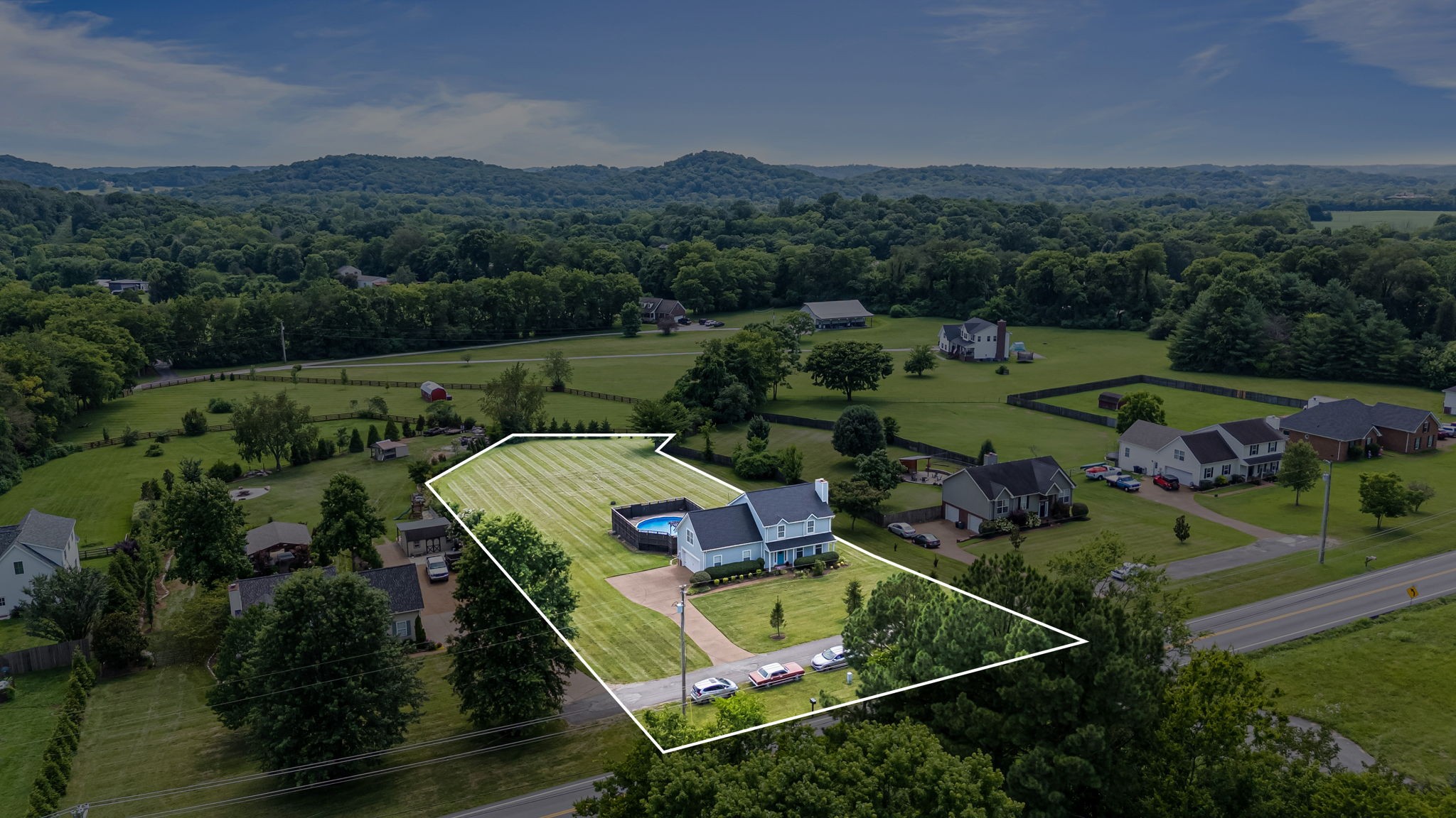 3137 Southall Road Franklin, TN 37064 - Photo 2 of 51 an aerial view of a house with pool outdoor seating yard and mountain view