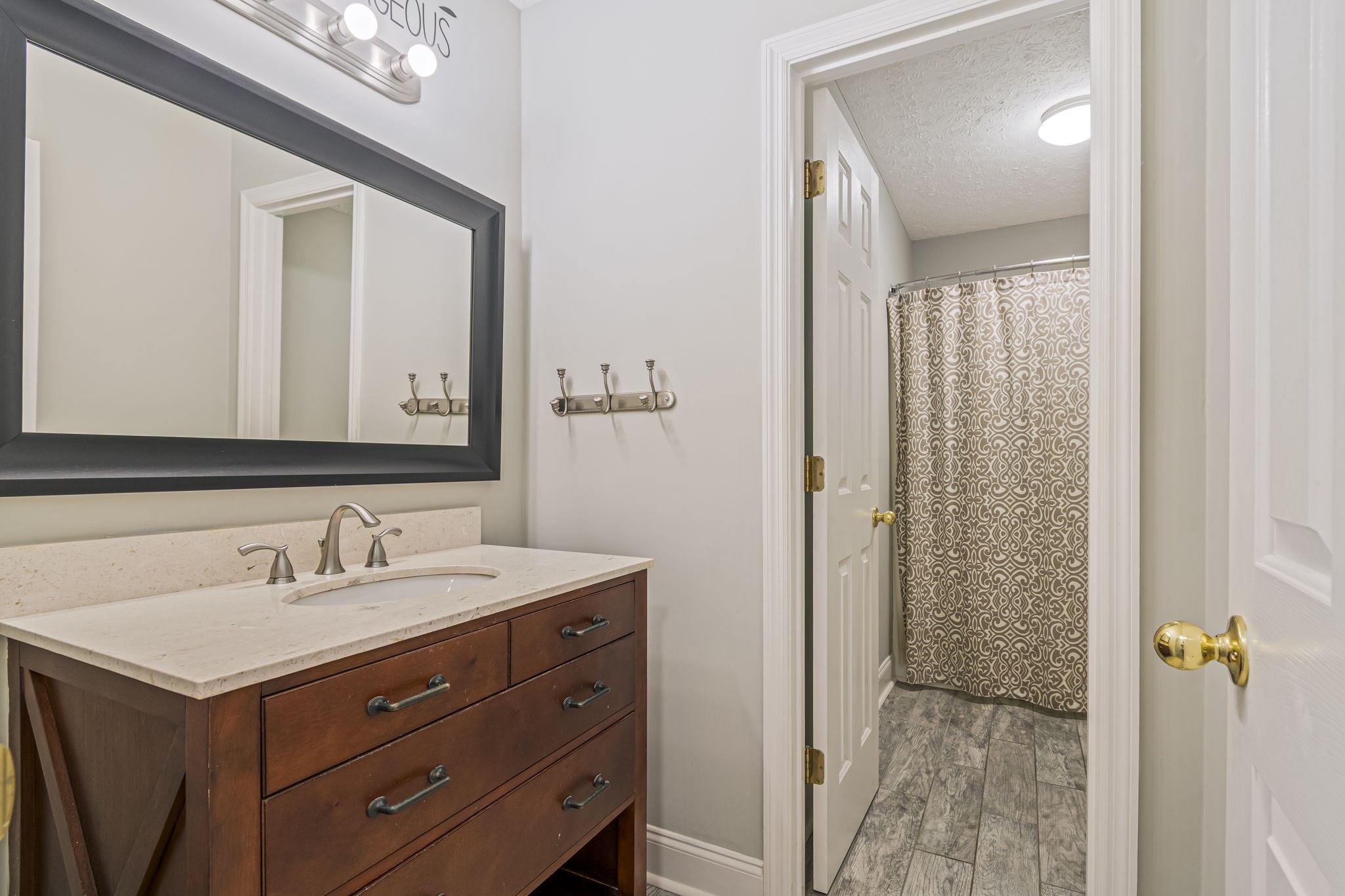 3137 Southall Road Franklin, TN 37064 - Photo 24 of 51 a bathroom with a sink and a mirror