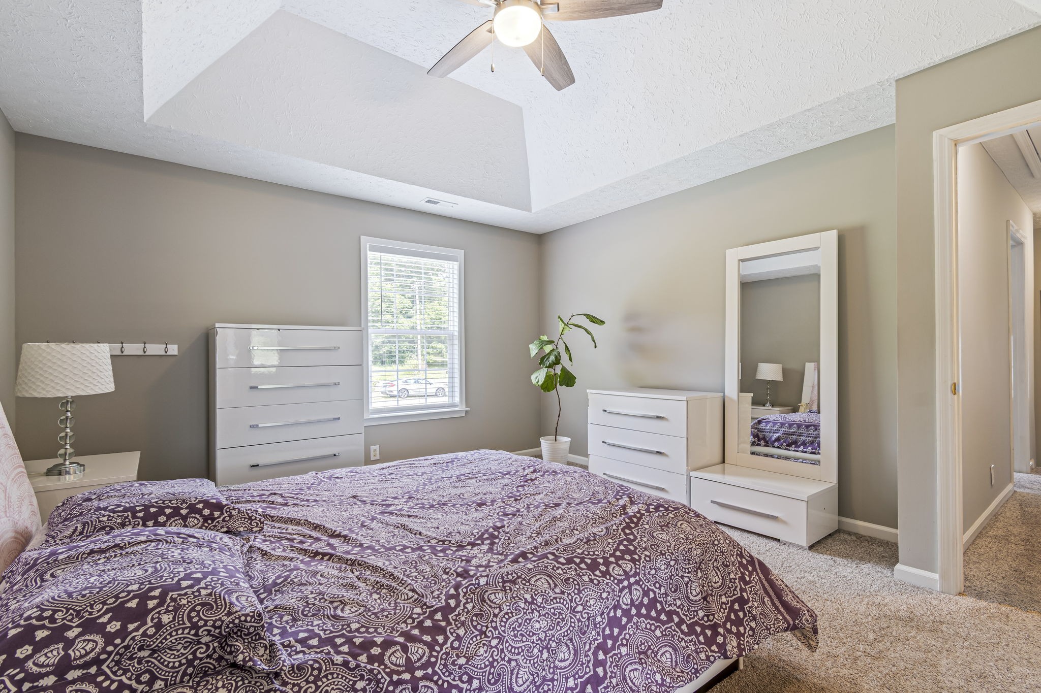 3137 Southall Road Franklin, TN 37064 - Photo 28 of 51 a bedroom with a large bed and a dresser