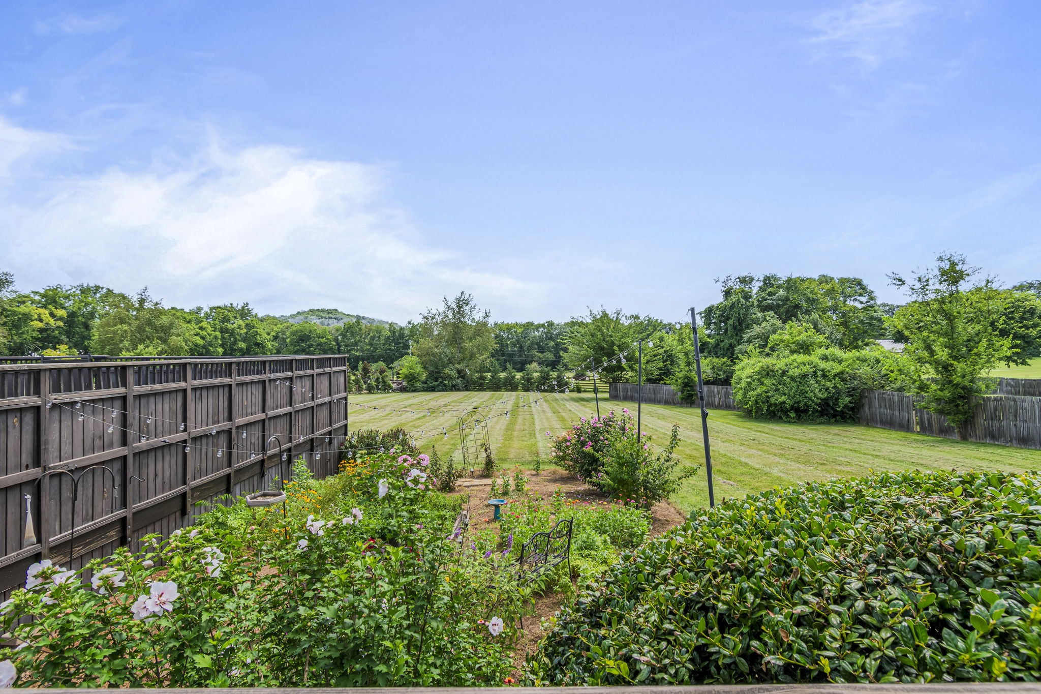 3137 Southall Road Franklin, TN 37064 - Photo 34 of 51 a view of a garden with wooden fence