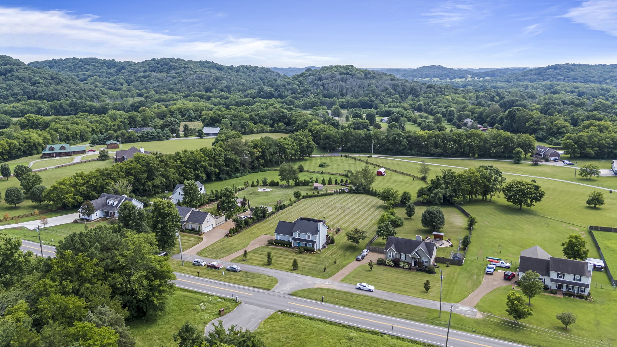 3137 Southall Road Franklin, TN 37064 - Photo 48 of 51 aerial view of a house with pool lake view and mountain view
