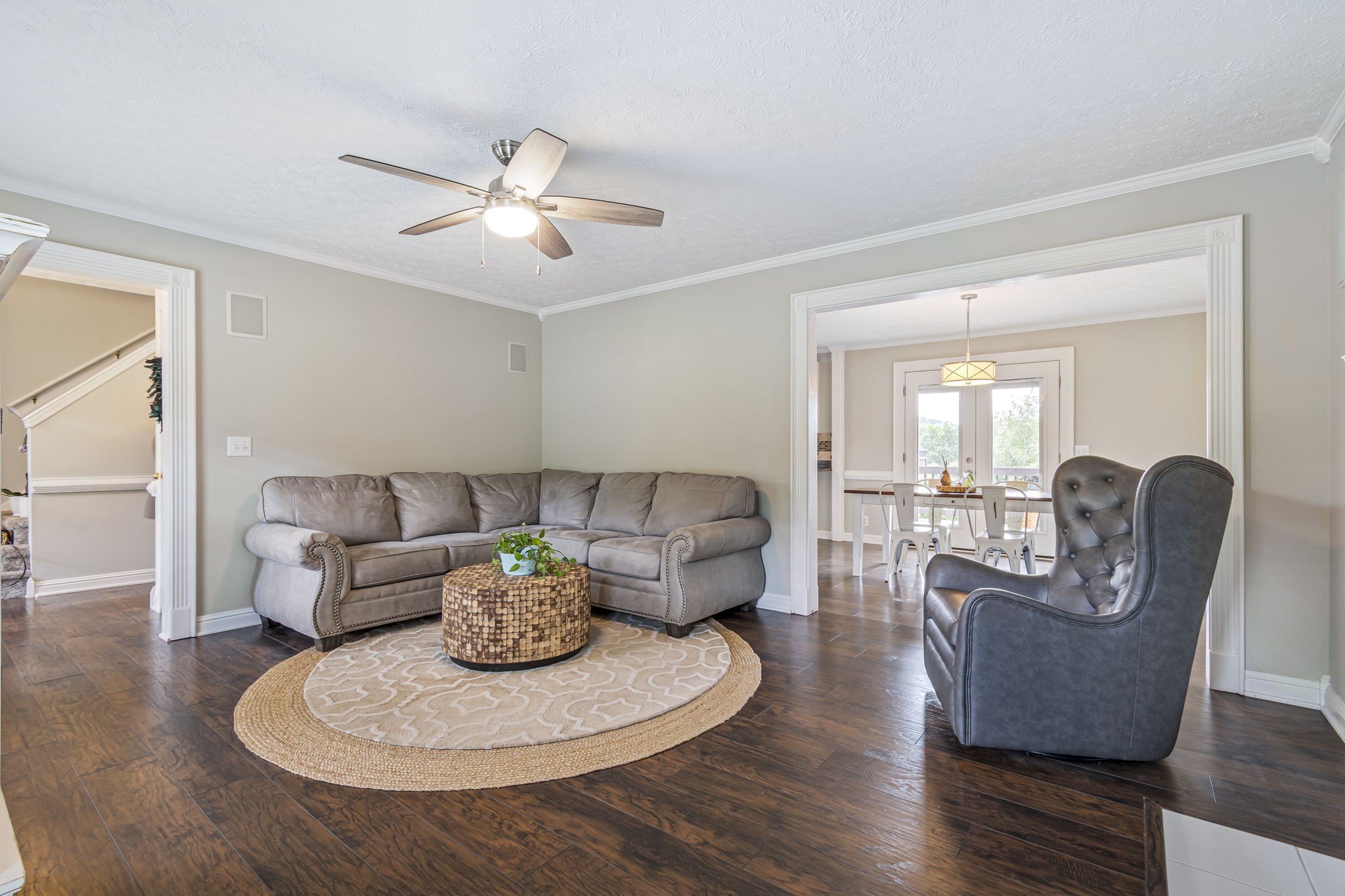 3137 Southall Road Franklin, TN 37064 - Photo 10 of 51 a living room with furniture a chandelier and a dining room