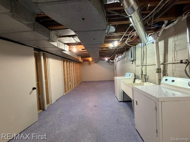 971 Canterbury Road Grosse Pointe, MI 48236 - Photo 30 of 30 Unfinished basement with exposed ceiling joists and ductwork, framing for partition walls, concrete block walls, and speckled flooring