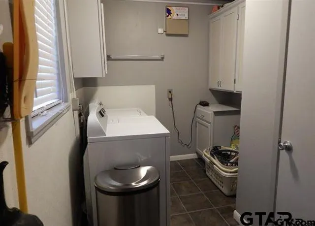 a bathroom with a toilet and a sink