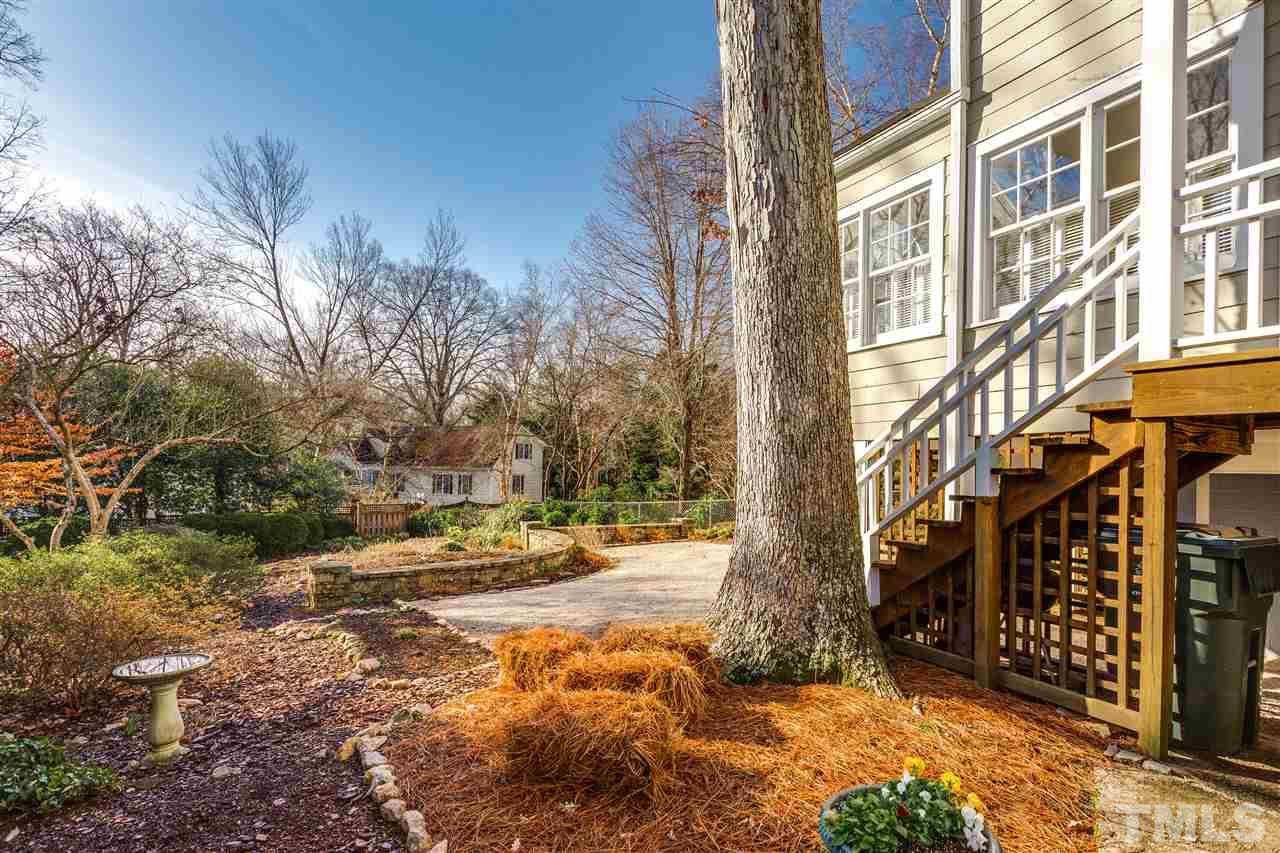 2514 Beechridge Road Raleigh, NC 27608 - Photo 4 of 25 a view of a street with houses
