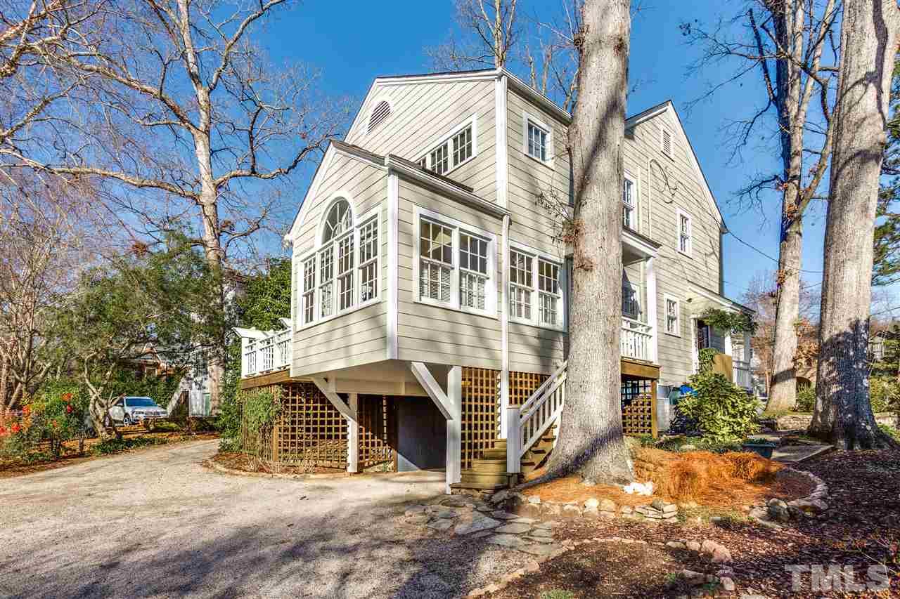 2514 Beechridge Road Raleigh, NC 27608 - Photo 5 of 25 a view of a house with a yard