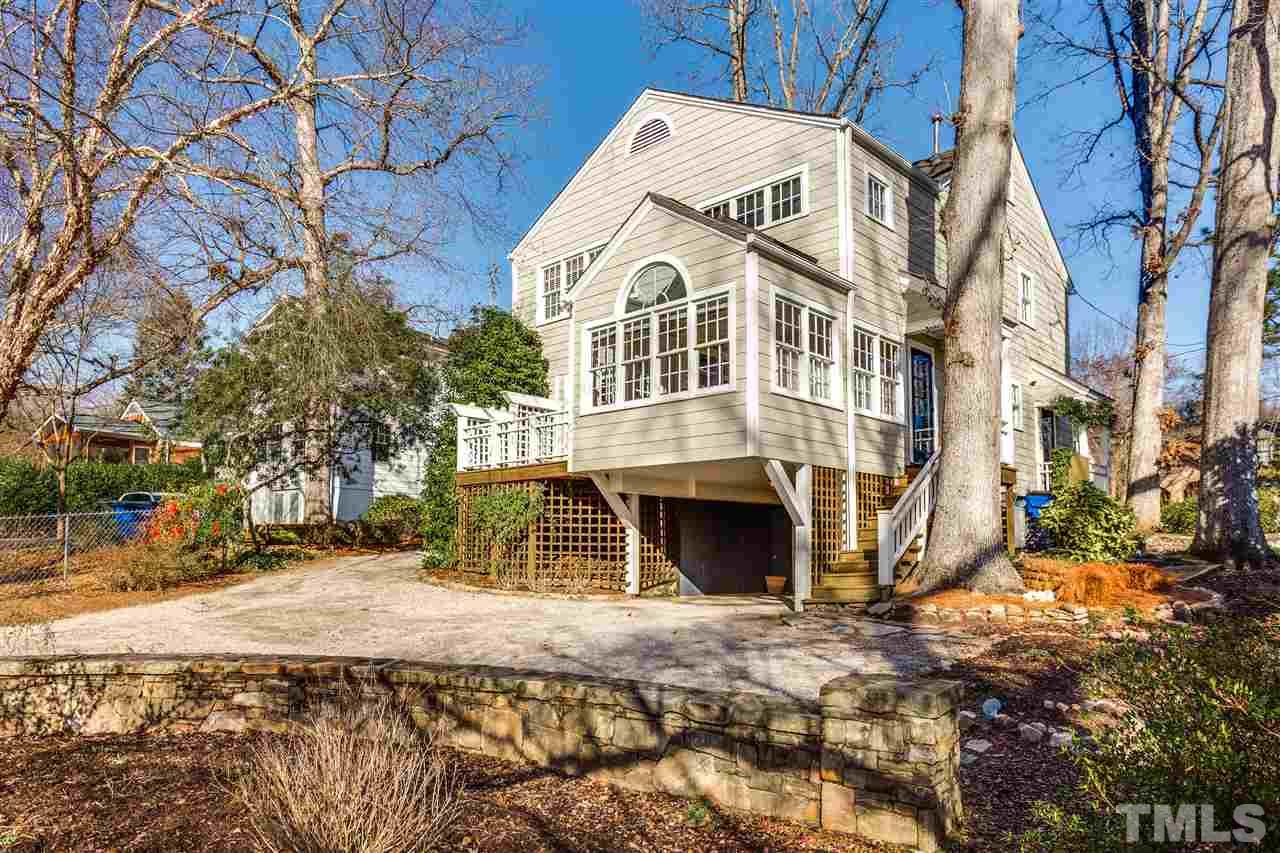 2514 Beechridge Road Raleigh, NC 27608 - Photo 6 of 25 a front view of a house with a yard