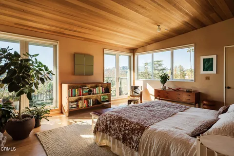 a view of a lake from a balcony