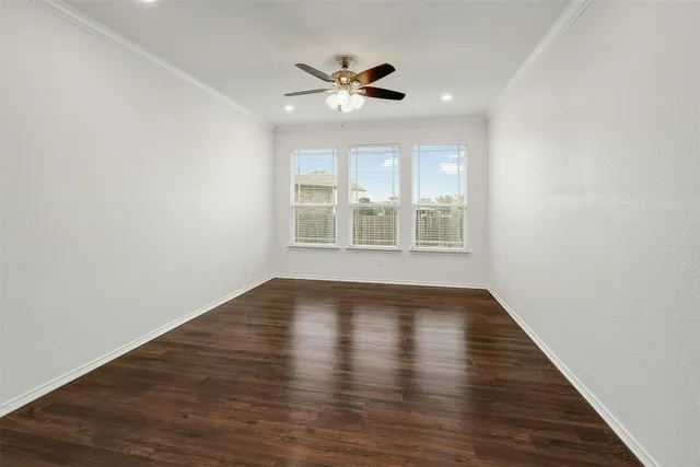 a kitchen with a table and chairs in it