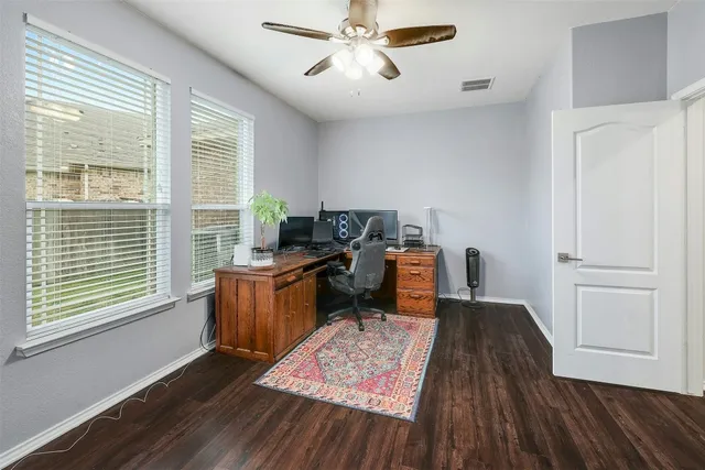 a bathroom with a double vanity sink a mirror and a shower