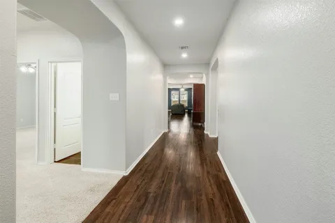 a bathroom with a double vanity sink a mirror and a shower