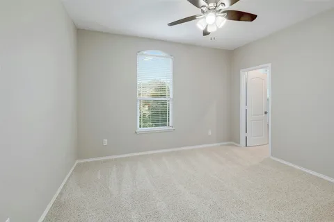 a bed room with a bed and furniture