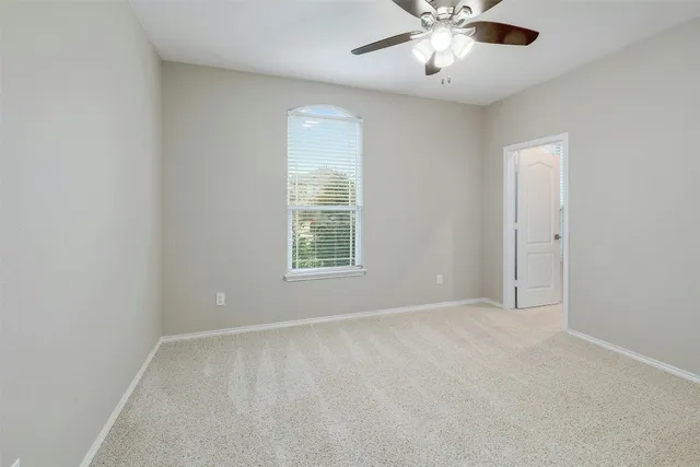 a bed room with a bed and furniture