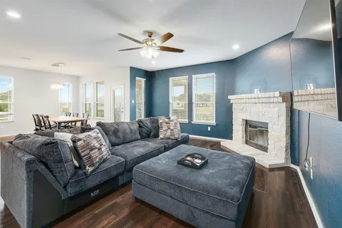 a big house with a big yard and large trees