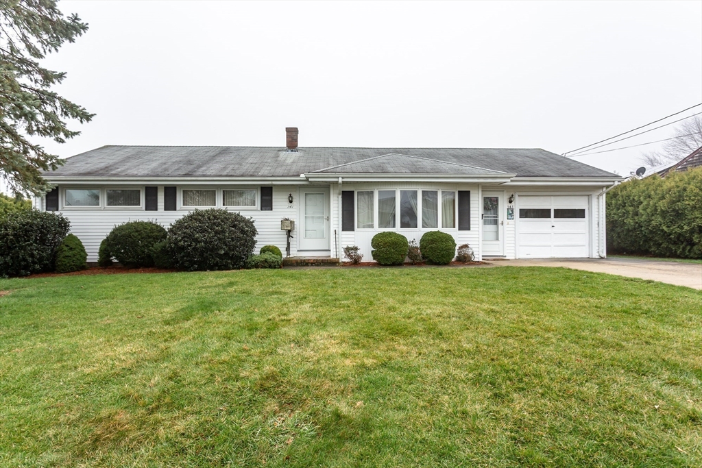 141 Kaufman Road Somerset, MA 02726 - Photo 1 of 26 a view of a house with a garden